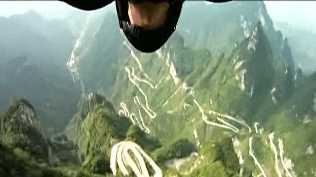 Wingsuit Flier Jumps From Chinese Mountain Peak