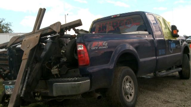 Car owner steals tow truck with repossessed SUV attached