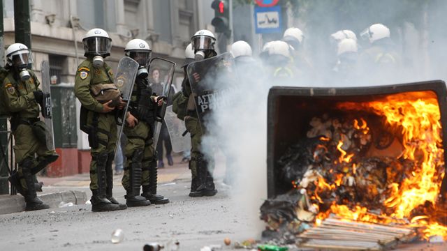 Angry protesters clash with police in Greece