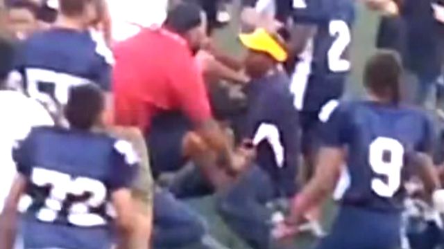 Foot-brawl: Coaches duke it out on field