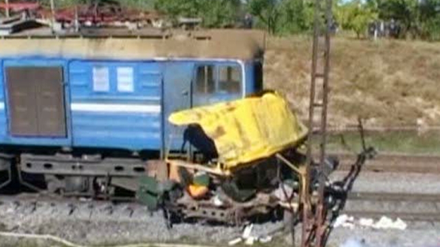 Around the World: Train Collides With Bus