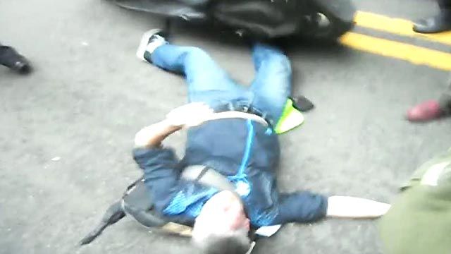 Police Scooter Runs Over Wall St. Protester