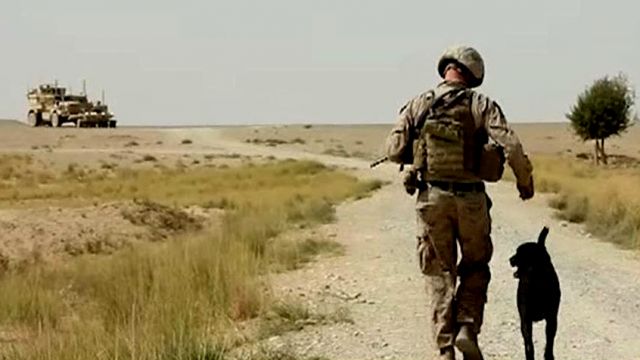 Lt. Col. Oliver North on patrol with Marines in Afghanistan