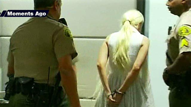 Lindsay Lohan Leaves Court in Handcuffs