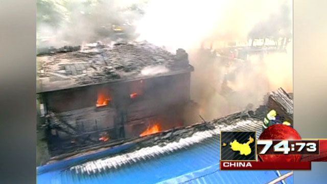 Around the World: Massive blaze destroys homes in China