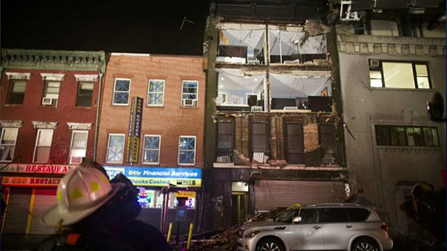 NYC building facade crashes onto city street