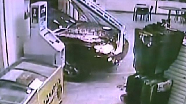 Car Slams Into Gas Station