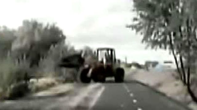 Front-Loader Leads Police in Slow-Speed Chase