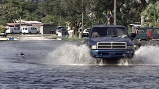Fla. Residents Struggle with Flood Clean-up