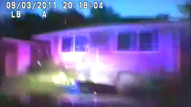 Cop Cruiser Crashes Into House