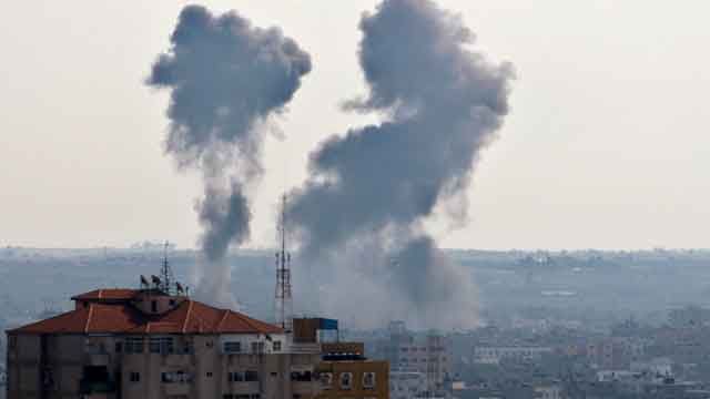 Hamas militants fire dozens of rockets at Israel