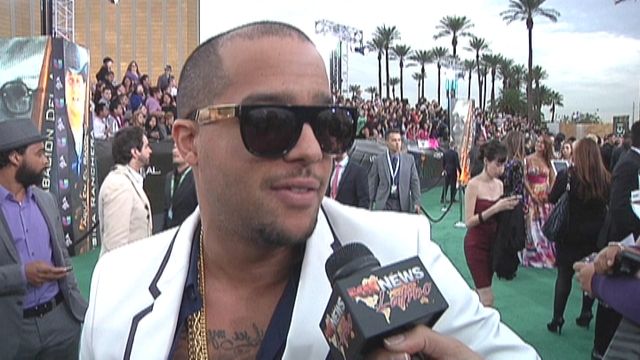 At the Latin GRAMMY's Green Carpet with LMFAO