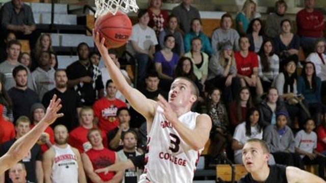 He's on fire! Hoopster shatters NCAA scoring record