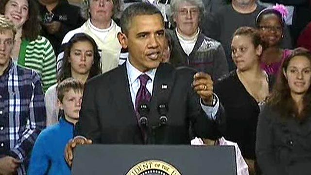 Obama Heckled During New Hampshire Speech
