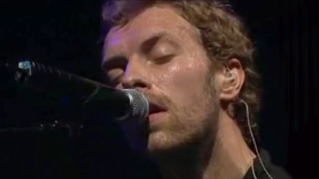 Coldplay vs. Tambourine Playing Fan