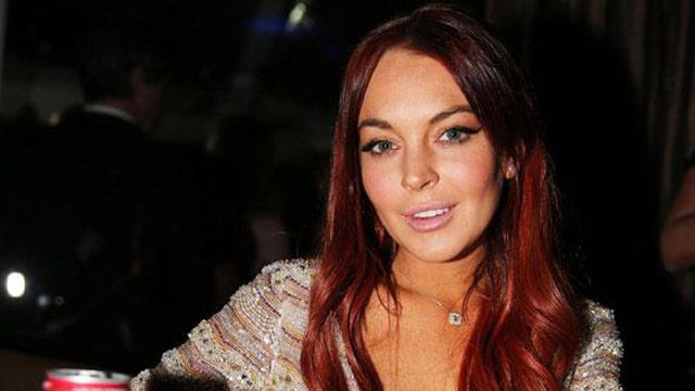 Lindsay Lohan charged with assault
