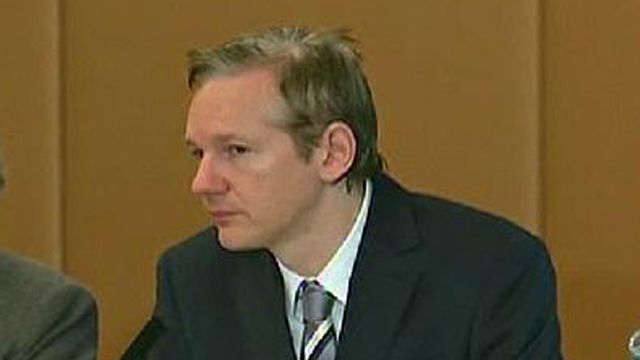 Charge Assange as a Spy?
