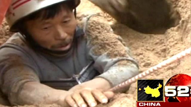 Around the World: Man Trapped in Sand Rescued in China