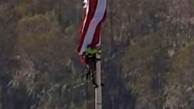Stuntman Climbs 300 Feet to Rescue U.S. Flag