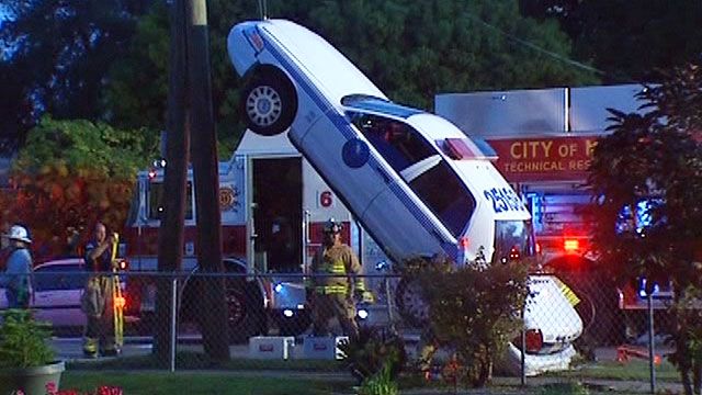 Police Car Climbs Pole in Florida
