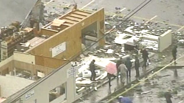 Residents Clean Up After Tornado 