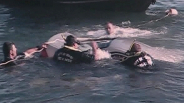 Rescuers Rush to Save Man From Sinking Car