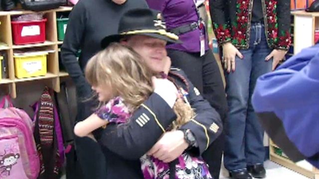 Soldier Surprises Two Daughters