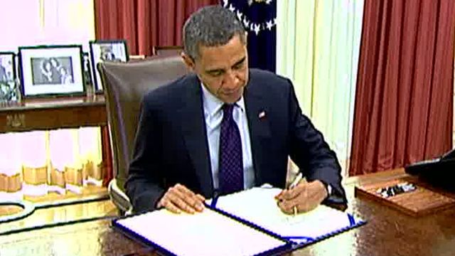 President Signs Payroll Tax Cut Extension into Law