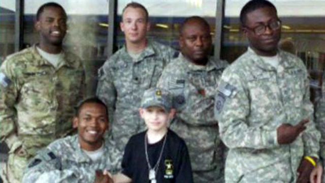 Little Boy Gives Troops a Big Welcome