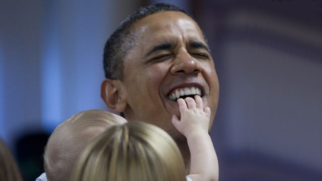 Baby Gives President Obama a Mouthful