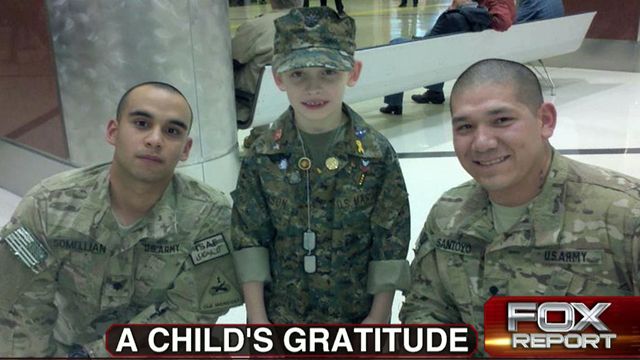 8-Year-Old Welcomes Soldiers in Atlanta